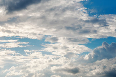 Clouds lighting up with sunlight.