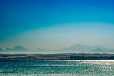Sea in egypt with mountains in background