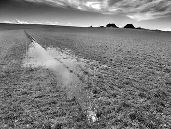 Scenic view of land against sky