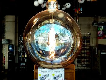 Close-up of illuminated lamp in building