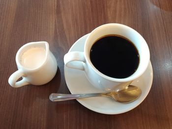 High angle view of coffee cup on table