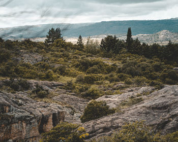 Scenic view of rocky mountains against sky