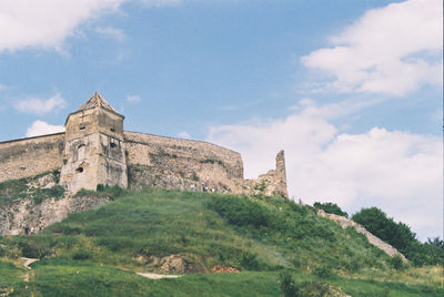 Low angle view of historic building against sky