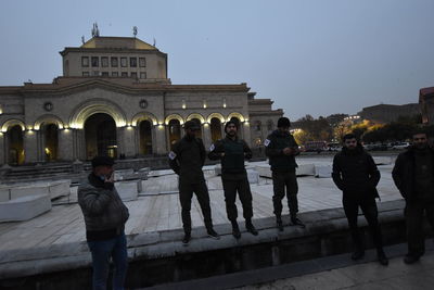 Group of people in front of building