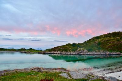 Scenic view of lake against sky during sunset