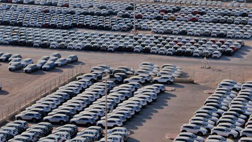 Aerial view of cars parked on parking lot