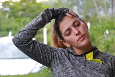 Portrait of young woman outdoors