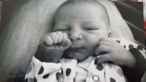 Close-up portrait of cute baby boy