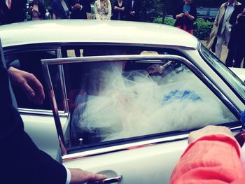 Cropped image of woman driving car