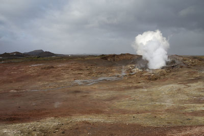 Scenic view of volcanic landscape against sky