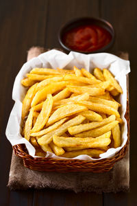 High angle view of bread and fries on table