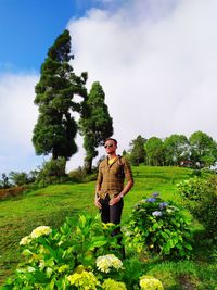 Two trees are hugging each other, holiday in india, west bengal, darjeeling. young man, beautiful 
