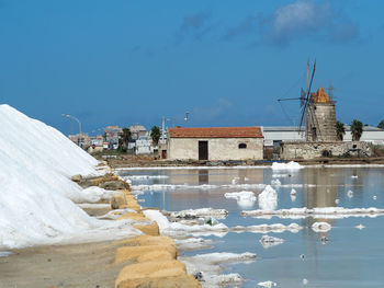 Buildings against sky during winter