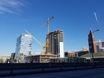 Construction site with buildings in background