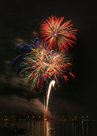 Firework display at night