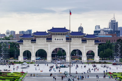 Group of people in front of historical building