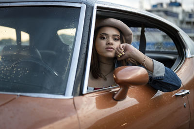 Teenage girl in car
