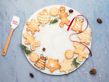 High angle view of cookies in plate on table