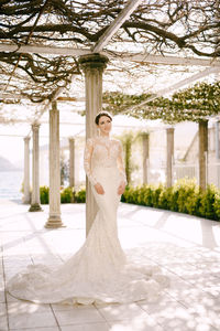 Rear view of woman standing in park