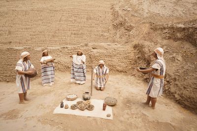 High angle view of people standing on ground