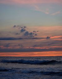 Scenic view of sea at sunset