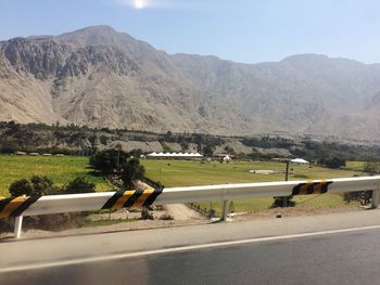 Scenic view of landscape against mountains