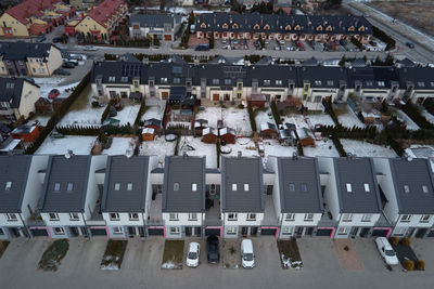 Aerial drone view of residential neighborhood in winter season