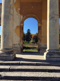 Trees seen through archway