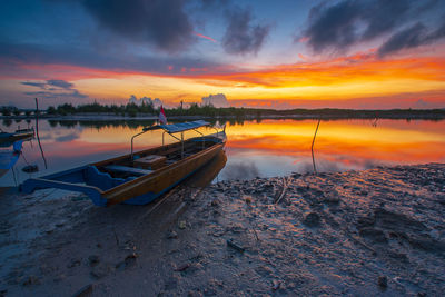 Scenic view of beach against sky during sunset