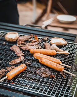 Close-up of meat on barbecue grill