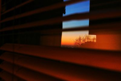 Close-up of cigarette against wall