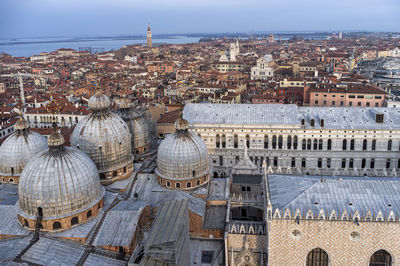 Aerial view of the domes of st. mark's basilica in venice, italy, and the city