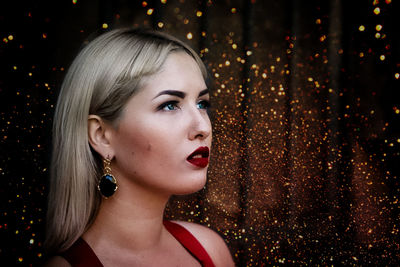 Portrait of a young woman looking away