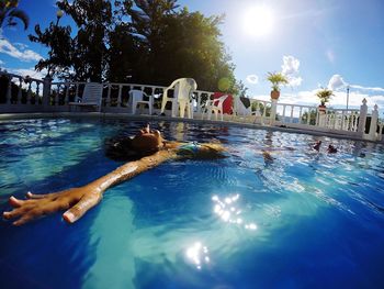 Girl swimming in pool