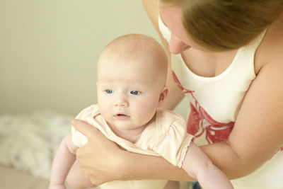 Portrait of mother with baby