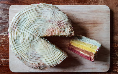 High angle view of cake on cutting board