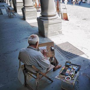 Rear view of man working