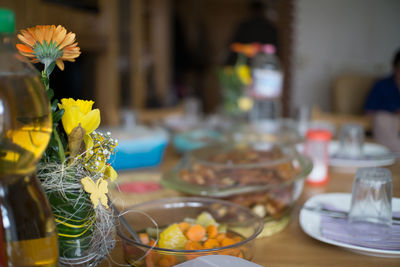 Close-up of vase on table in restaurant