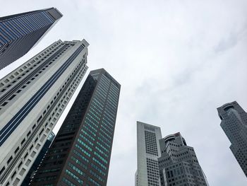 Low angle view of skyscrapers against sky