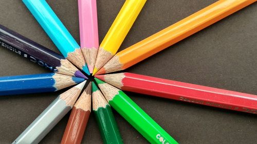 High angle view of multi colored pencils on table