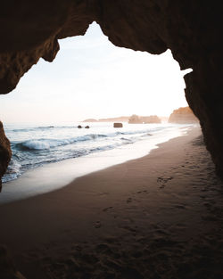 Scenic view of beach against sky