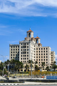 Buildings against blue sky