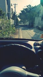 Road seen through car windshield