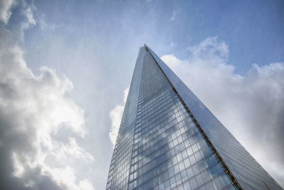 Low angle view of skyscraper against sky