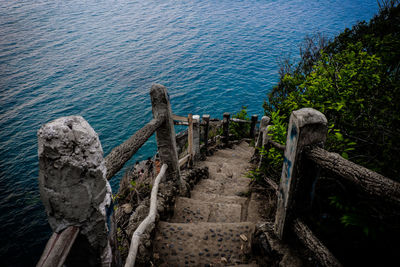 High angle view of wooden post on beach