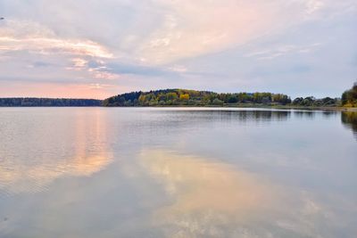 Reflection of clouds in calm sea