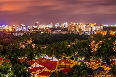 High angle view of illuminated buildings at night