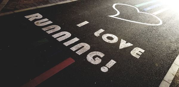 High angle view of text on road