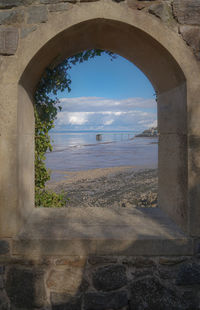 Landscape seen through window of building