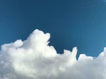 Low angle view of clouds in blue sky